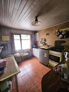 Kuchyň nebo kuchyňský kout v ubytování Guest House MiLinco - Ala Maison