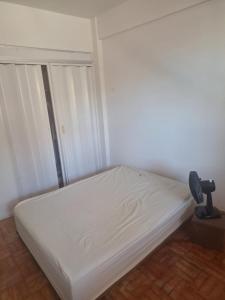 Ένα ή περισσότερα κρεβάτια σε δωμάτιο στο Beautiful ap in the heart of carnival