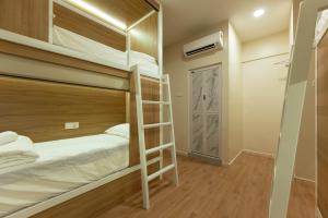 Postel nebo postele na pokoji v ubytování Dreambox Malacca + 20 fotografií