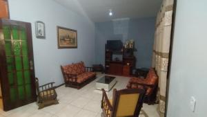 Et tv og/eller underholdning på Costa Azul ótima localização e conforto