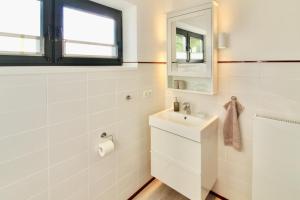 Ένα μπάνιο στο Ferienhaus Backbert & Steuerbert Kappeln Kopperby +27 φωτογραφίες