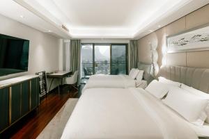 Fotografija v galeriji nastanitve 阳朔遇龙河畔丽诗酒店 v mestu Gaotian