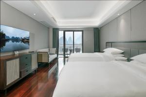 Fotografija v galeriji nastanitve 阳朔遇龙河畔丽诗酒店 v mestu Gaotian