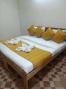 Postel nebo postele na pokoji v ubytování Baga Beach Prime