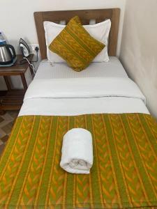 Postel nebo postele na pokoji v ubytování Baga Beach Prime