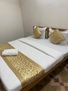 Postel nebo postele na pokoji v ubytování Baga Beach Prime