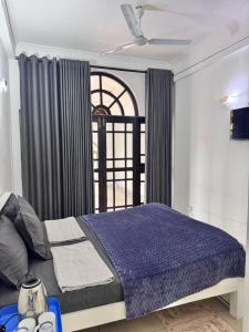 Postel nebo postele na pokoji v ubytování Colombo Hotel + 29 fotografií