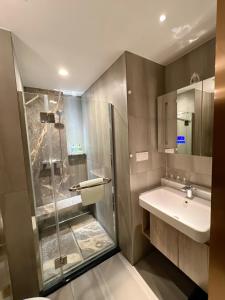 Koupelna v ubytování Zhongshan Perth Hotel Apartment - Shiqi Wanxianghui Branch