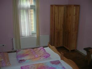 Posteľ alebo postele v izbe v ubytovaní Balatoni Panoráma Villa
