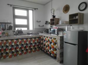 Kuchyň nebo kuchyňský kout v ubytování Location saisonnière Caza Villana + 27 fotografií