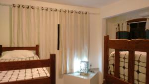 Hostel Vista do Mar客房内的一张或多张床位