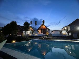 Bazén v ubytování Bukit Catu Bungalows nebo v jeho okolí