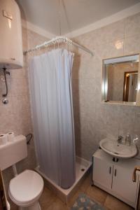 Ett badrum på Apartment Rakić Pomer