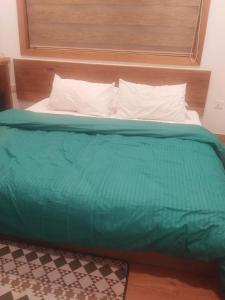 Postel nebo postele na pokoji v ubytování Equatorial Inn
