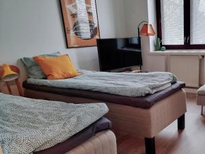 Postel nebo postele na pokoji v ubytování Studio Porin Karhu, home away home in Pori city center, free parking