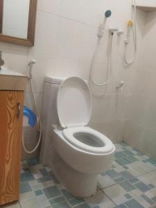 Koupelna v ubytování Equatorial Inn