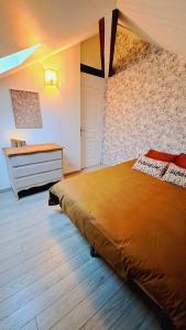 Postel nebo postele na pokoji v ubytování Landria Home - appartement 1 chambre proche de la Gare de reims centre