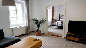 Posteľ alebo postele v izbe v ubytovaní Apartman Široká