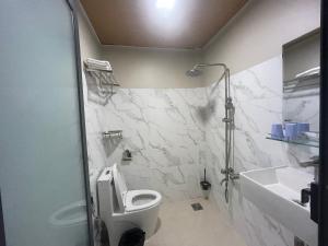 Koupelna v ubytování Kim Mau Motel