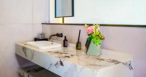 Foto Jinghongis asuva majutusasutuse 西双版纳回见江景酒店 galeriist