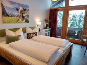 Postel nebo postele na pokoji v ubytování Haus Miele