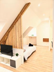 Postel nebo postele na pokoji v ubytování Zen lodge jacuzzi privé + 11 fotografií