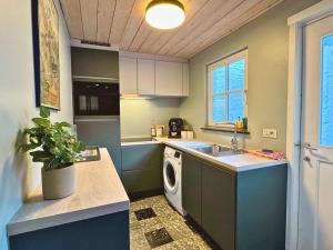 Η κουζίνα ή μικρή κουζίνα στο Acadia by De Drie Koningen