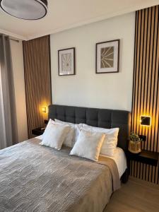 Postel nebo postele na pokoji v ubytování Aparthotel Costa Blanca
