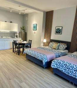 Posteľ alebo postele v izbe v ubytovaní Exclusive Apartments Smolna