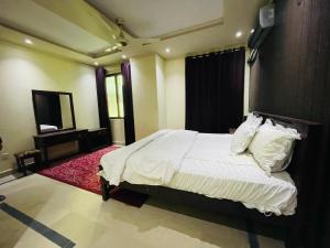 Postel nebo postele na pokoji v ubytování Hotel Le Meridien + 101 fotografií