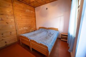 Postel nebo postele na pokoji v ubytování Guesthouse Zebo
