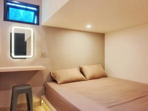 Postel nebo postele na pokoji v ubytování Bromo Dormitory