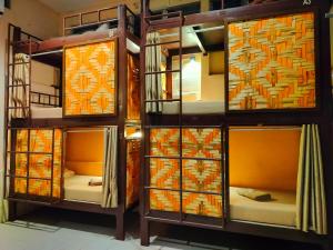 Postel nebo postele na pokoji v ubytování Cebu Pungko-pungko Hostel