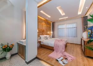 Yunyin Sanqiu Inn客房内的一张或多张床位