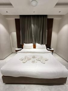 Hotel Aishwarya客房内的一张或多张床位