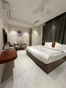 Hotel Aishwarya客房内的一张或多张床位