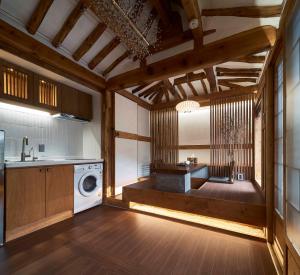 Ένα ή περισσότερα κρεβάτια σε δωμάτιο στο Luxury Hanok Harmony House