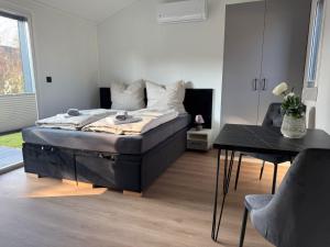 Postel nebo postele na pokoji v ubytování Tiny Hotel in Hollenstedt