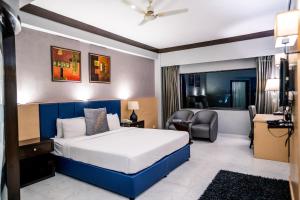 Letto o letti in una camera di Hotel Pal Heights