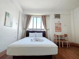 Giường trong phòng chung tại Sulit Budget Hotel VMapa +41 ảnh