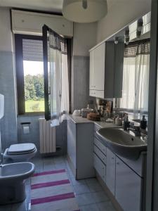 Koupelna v ubytování B&B Busto Garolfo + 42 fotografií