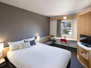 Postel nebo postele na pokoji v ubytování ibis Newcastle