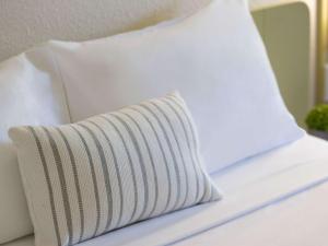 Postel nebo postele na pokoji v ubytování ibis Budget - Newcastle