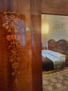 Postel nebo postele na pokoji v ubytování B&B La Veranda - Iseo