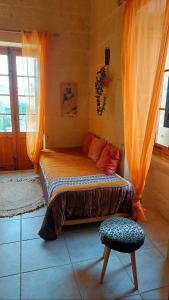 Postel nebo postele na pokoji v ubytování Ta' Didi B&B