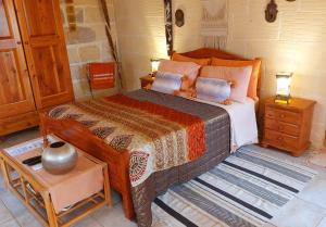 Postel nebo postele na pokoji v ubytování Ta' Didi B&B