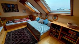 Postel nebo postele na pokoji v ubytování Ferienwohnung Oberstaufenblick