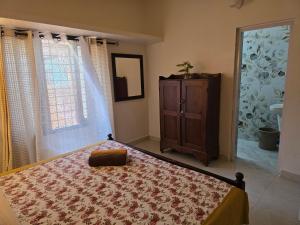 Bella Homestay Kerala客房内的一张或多张床位