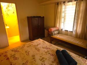 Bella Homestay Kerala客房内的一张或多张床位