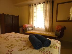 Bella Homestay Kerala客房内的一张或多张床位